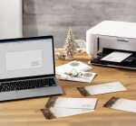 Weihnachts-Umschlag Weihnachtssterne beige/rot/grün DIN lang 50 Umschl