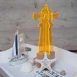 Elliot Lichtzauber 3D-Leuchtturm midi auf Holzsockel, 10 cm, orange