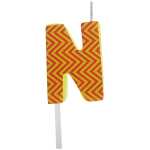 Buchstabenkerze N rot gelb gezackt, zur Dekoration von...